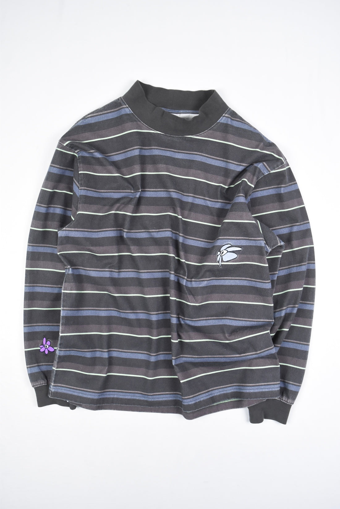 STRIPED GESTURES MOCK NECK PULLOVER