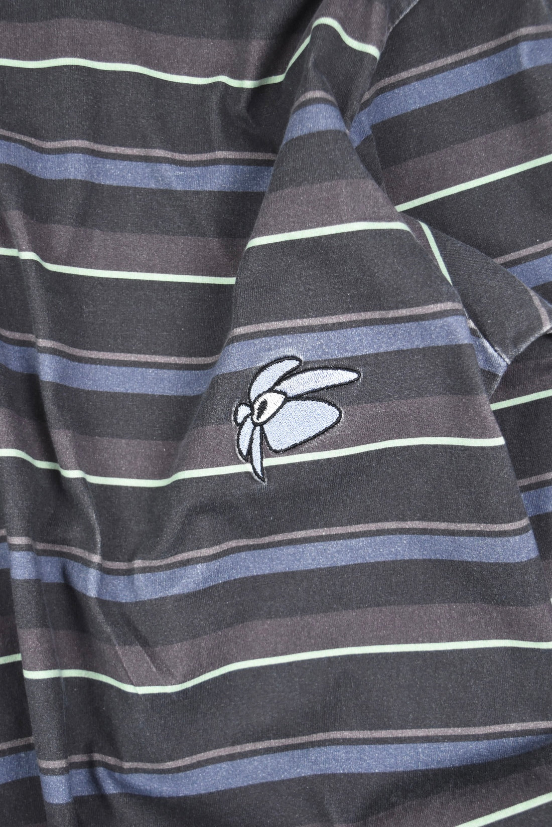 STRIPED GESTURES MOCK NECK PULLOVER