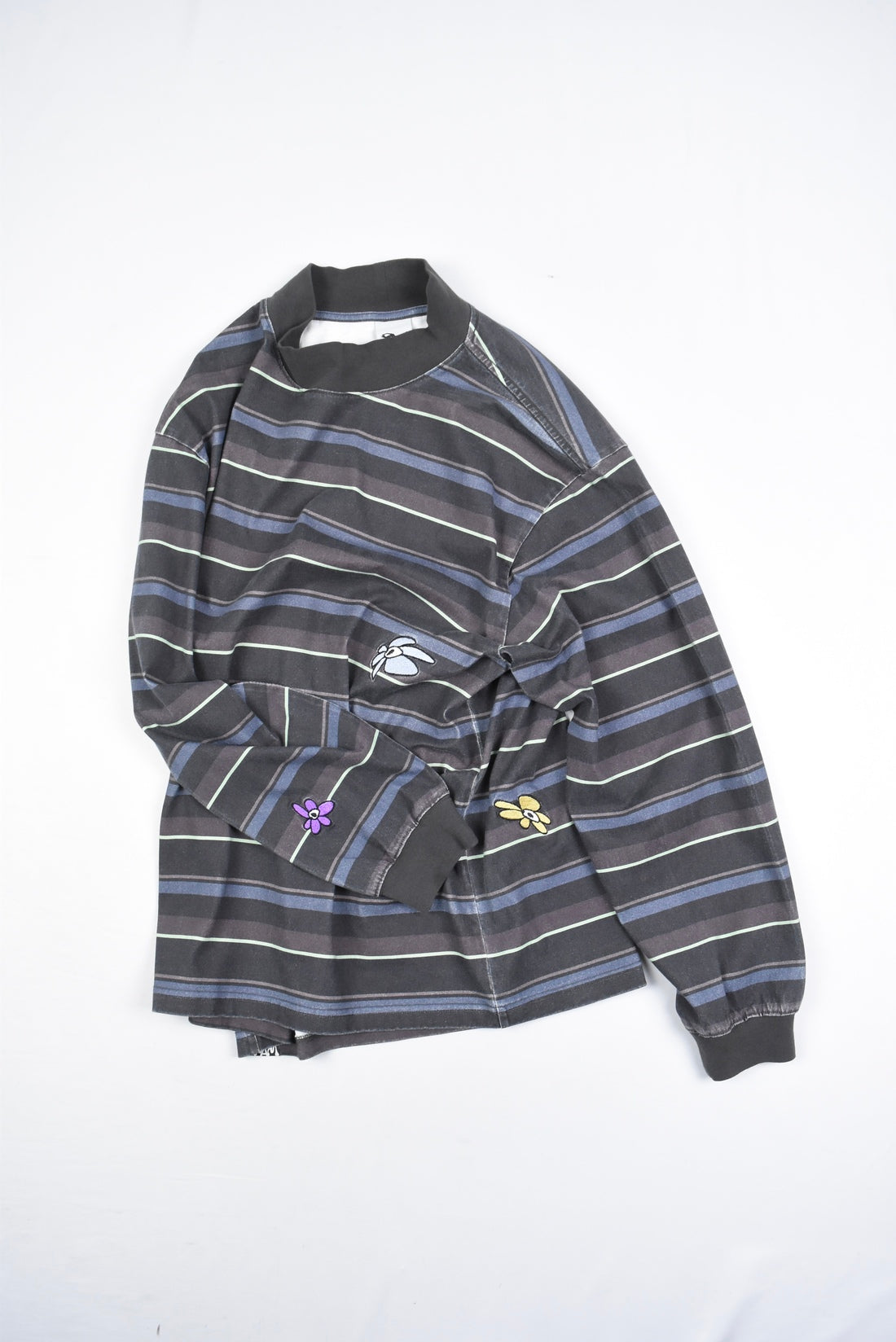STRIPED GESTURES MOCK NECK PULLOVER