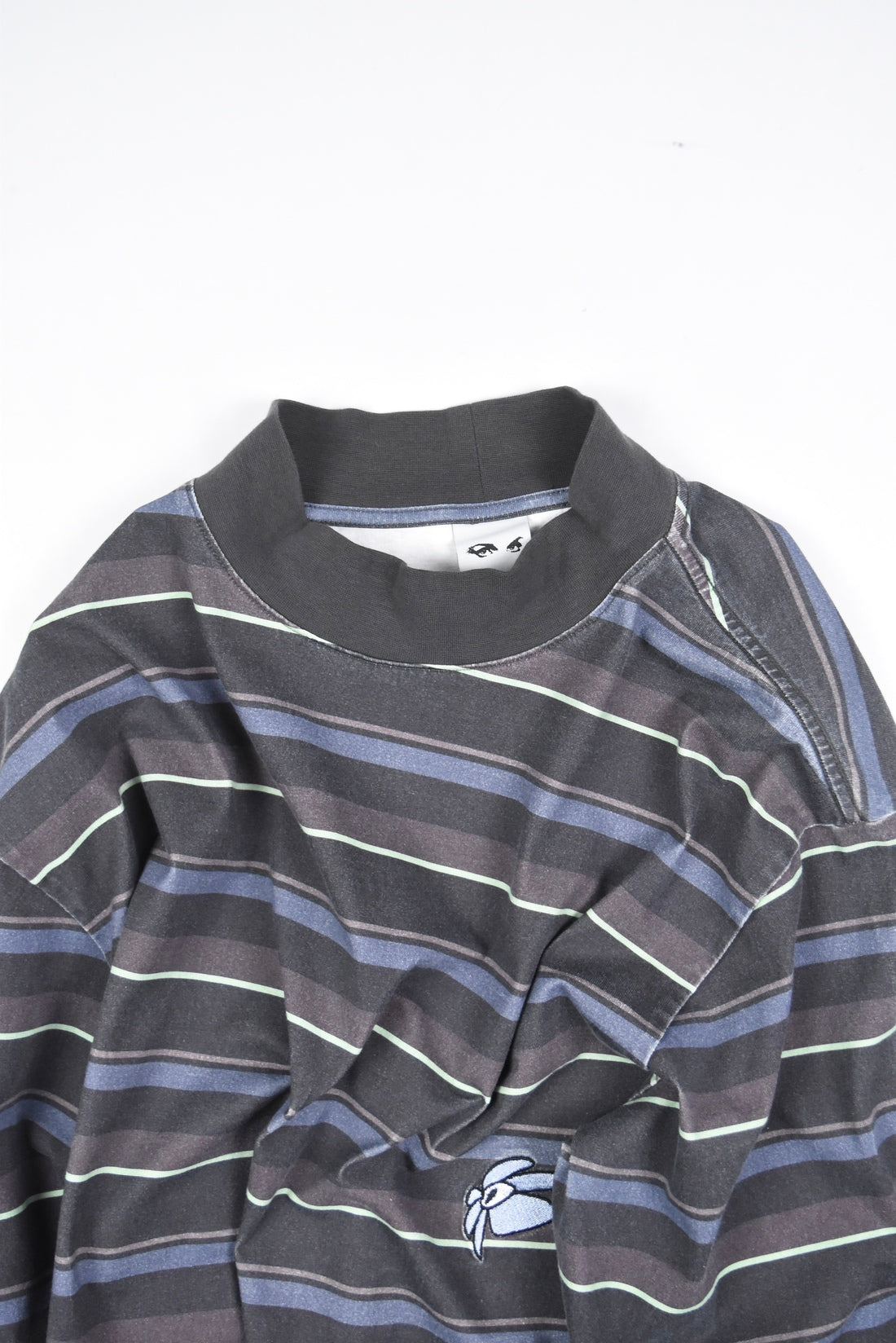 STRIPED GESTURES MOCK NECK PULLOVER