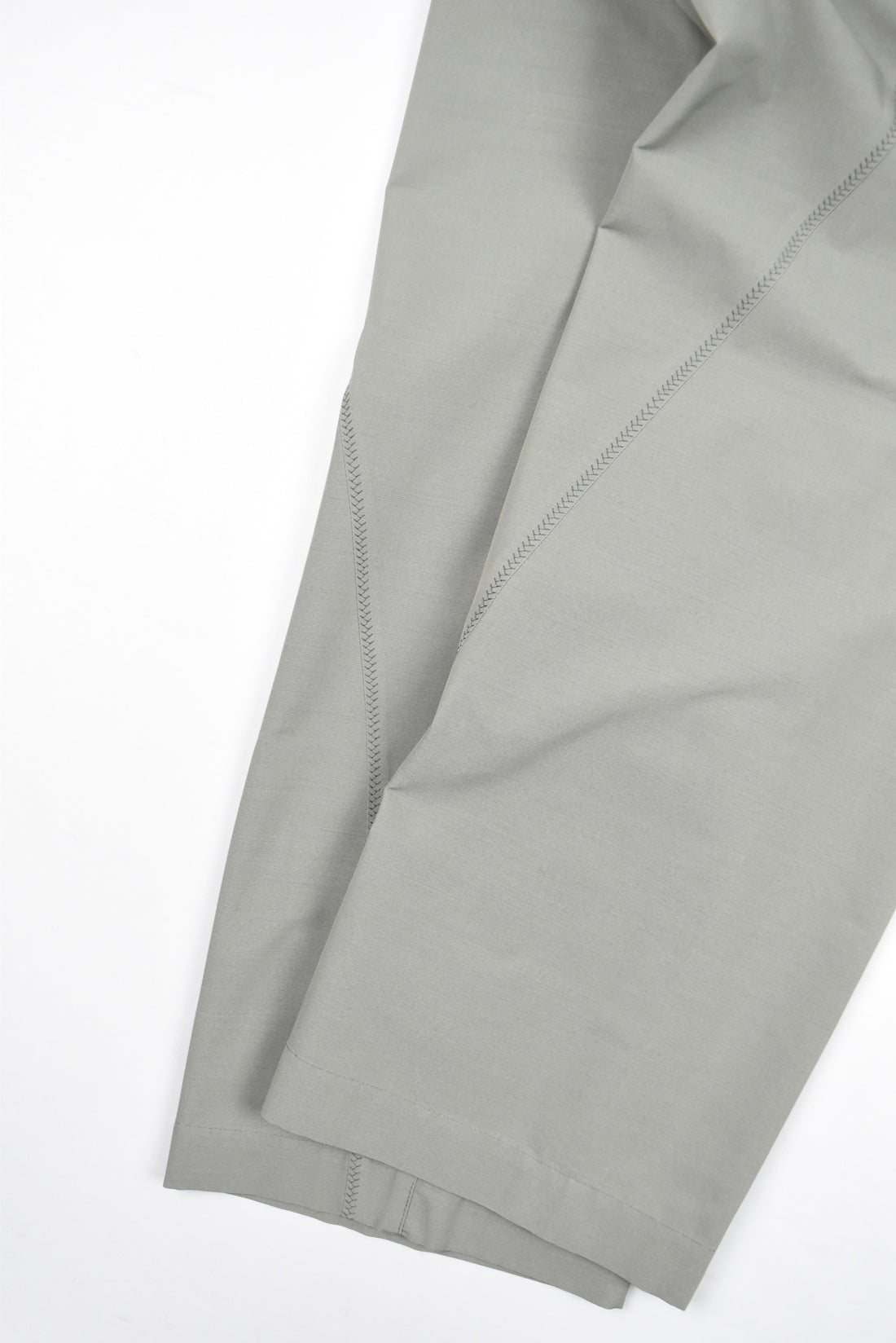 CURVE CLOSURE TROUSERS