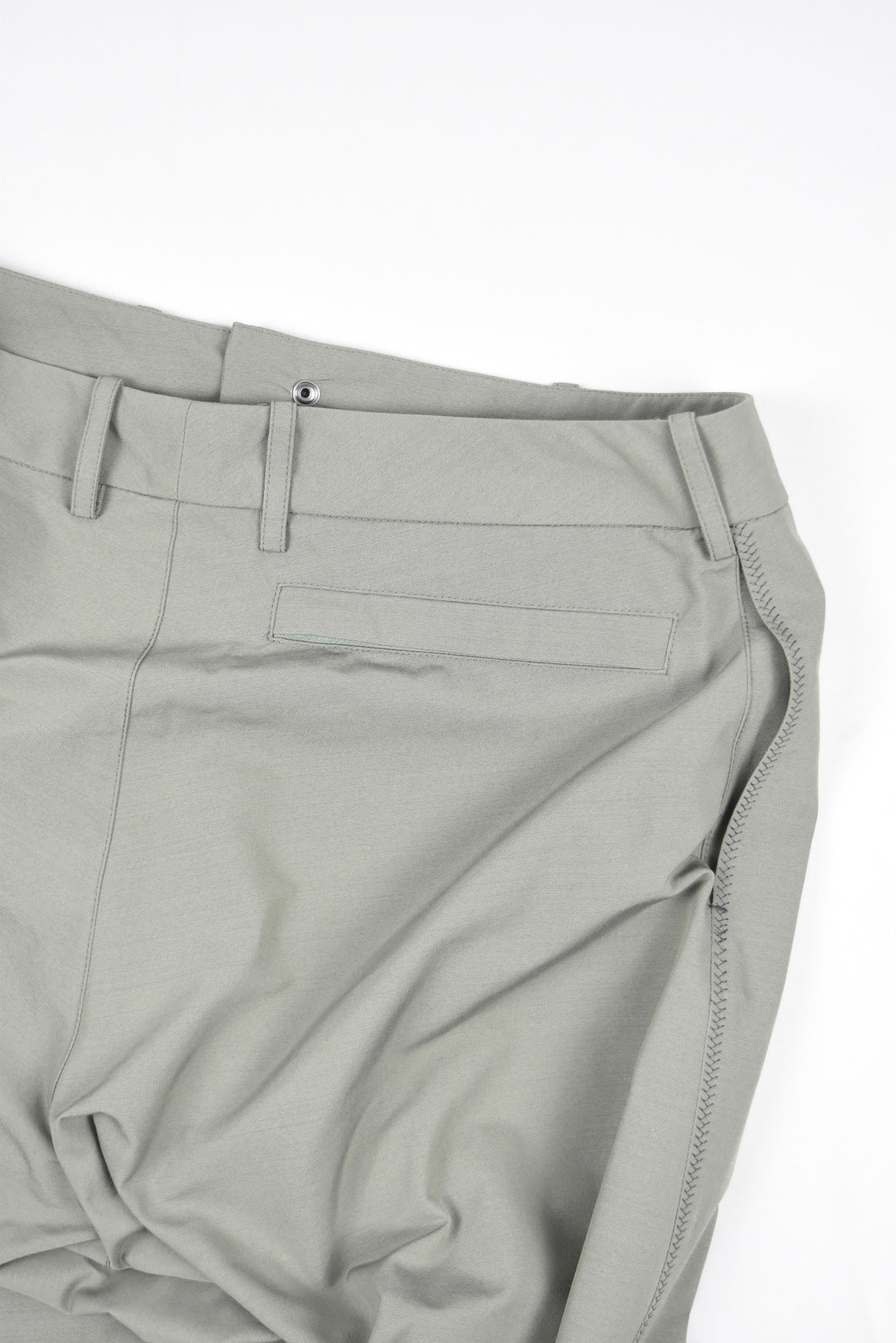 CURVE CLOSURE TROUSERS