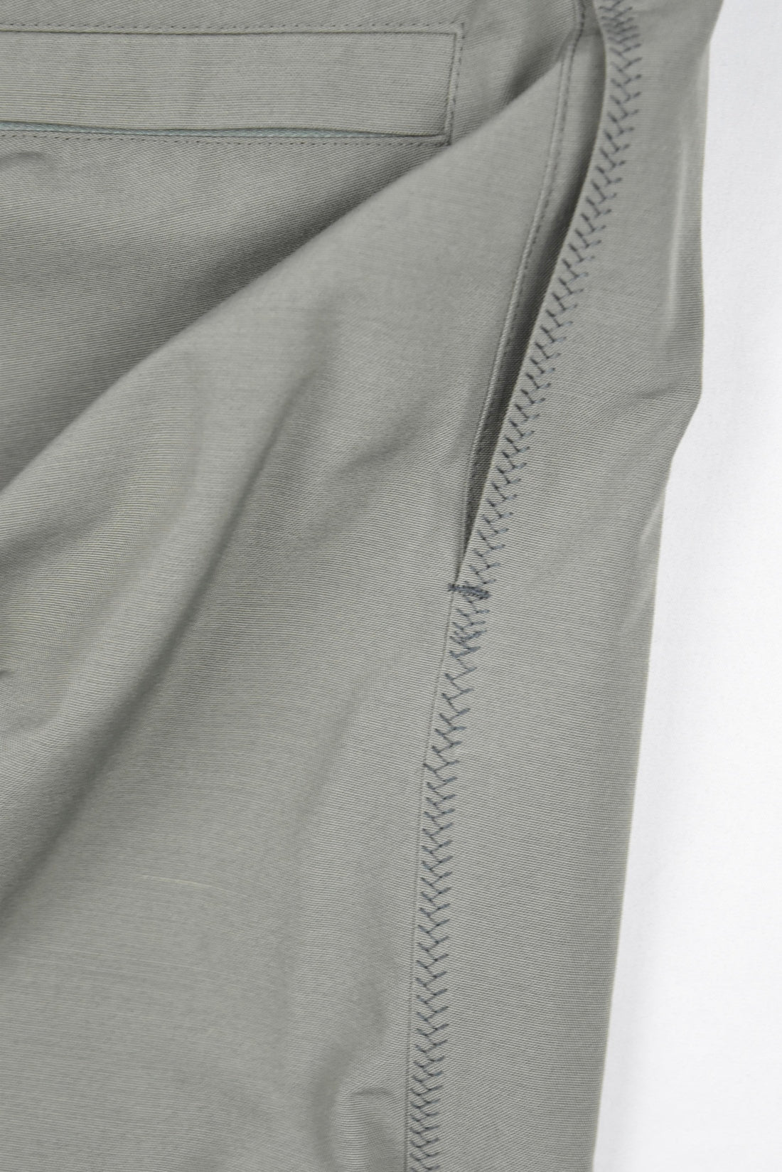 CURVE CLOSURE TROUSERS