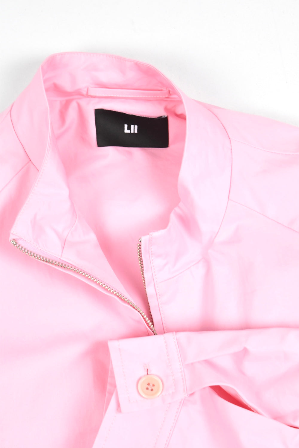 Cropped jacket with back flap